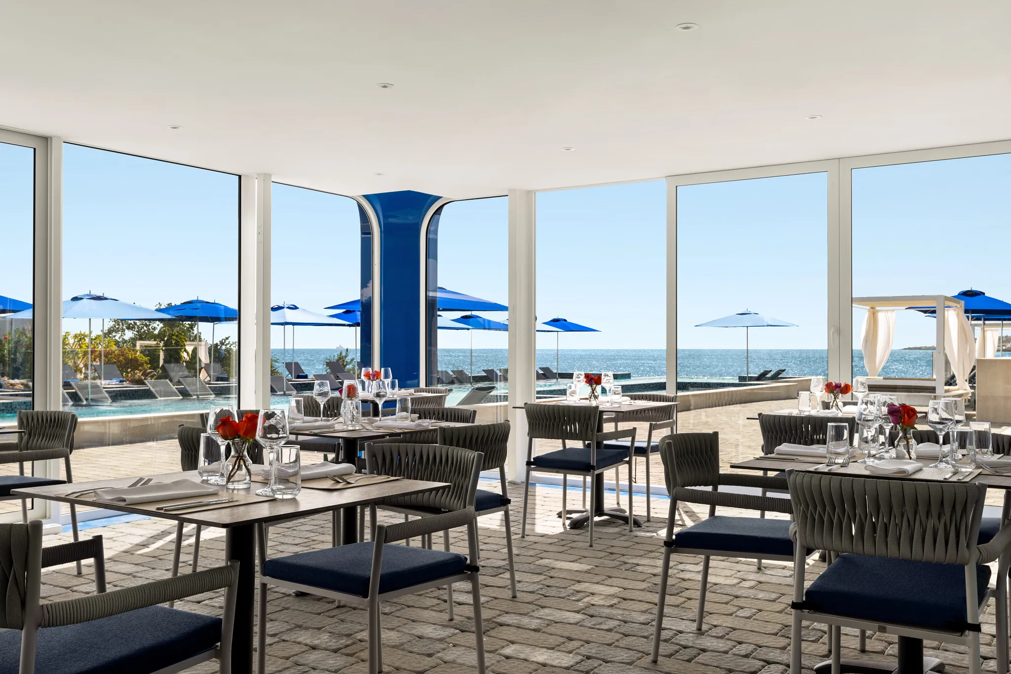 Battellino restaurant at Dreams Curaçao Resort featuring oceanfront Mediterranean dining with elegant terrace seating and sea views.