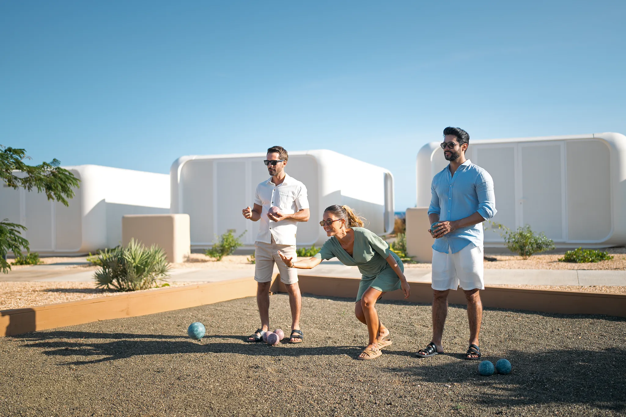 Guests playing bocce ball outdoors at Dreams Curaçao Resort, Spa & Casino.