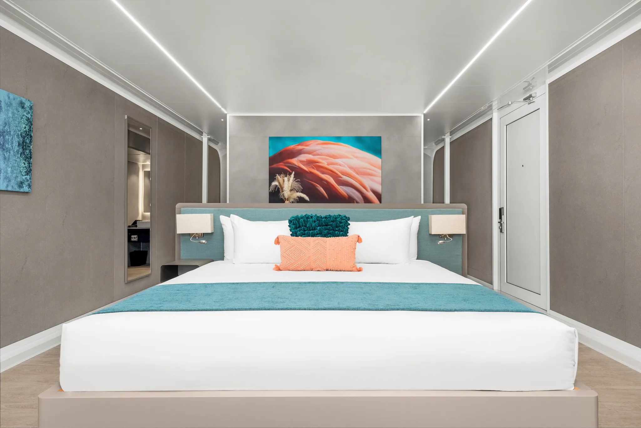 King bed in beachfront bungalow with modern décor at Dreams Curaçao Preferred Club.