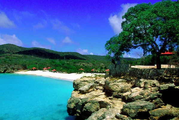 Grote Knip Beach near Dreams Curaçao Resort, Spa & Casino with turquoise waters and scenic cliffside views