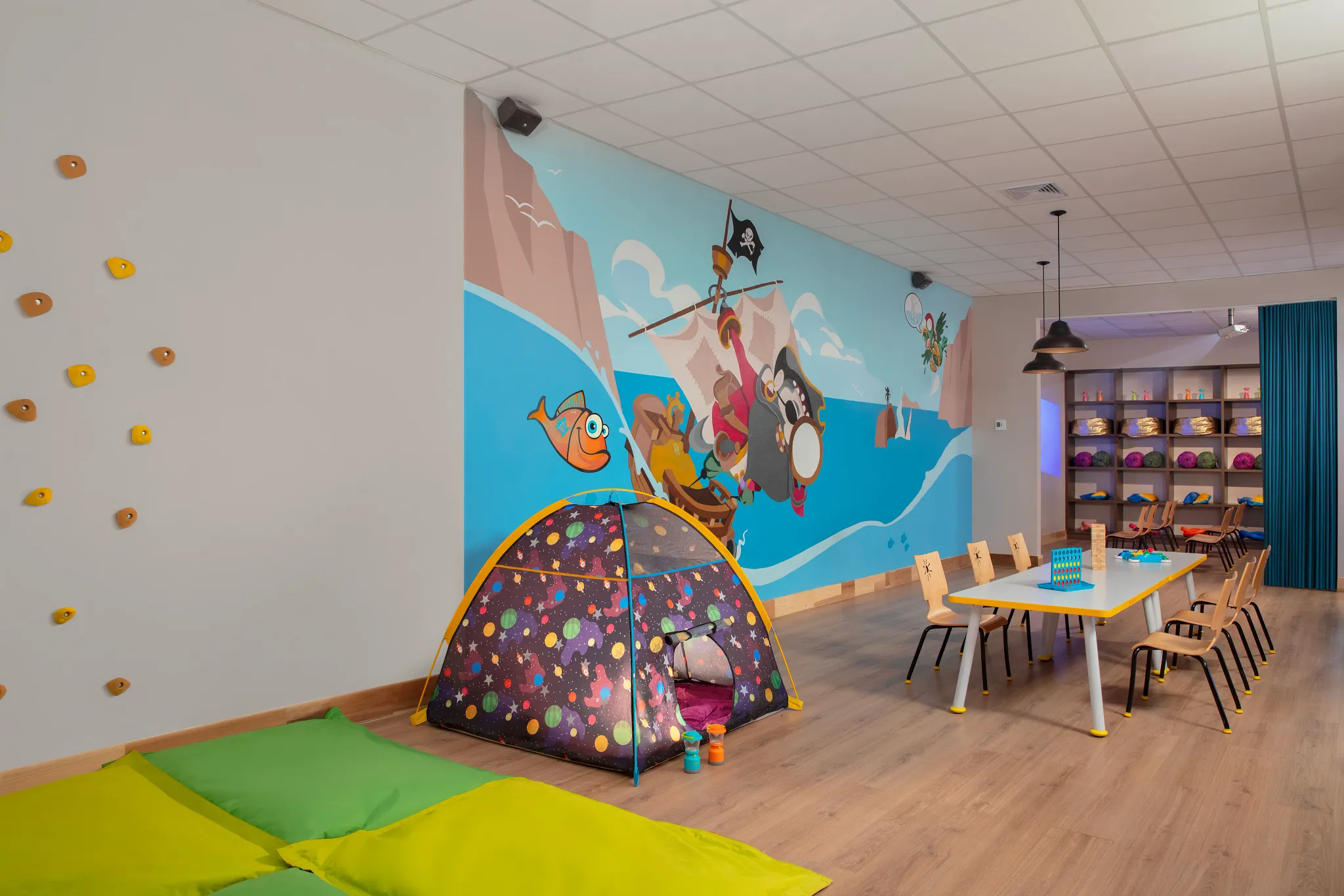 Colorful kids club playroom with games and activities at Dreams Curaçao Resort, Spa & Casino.