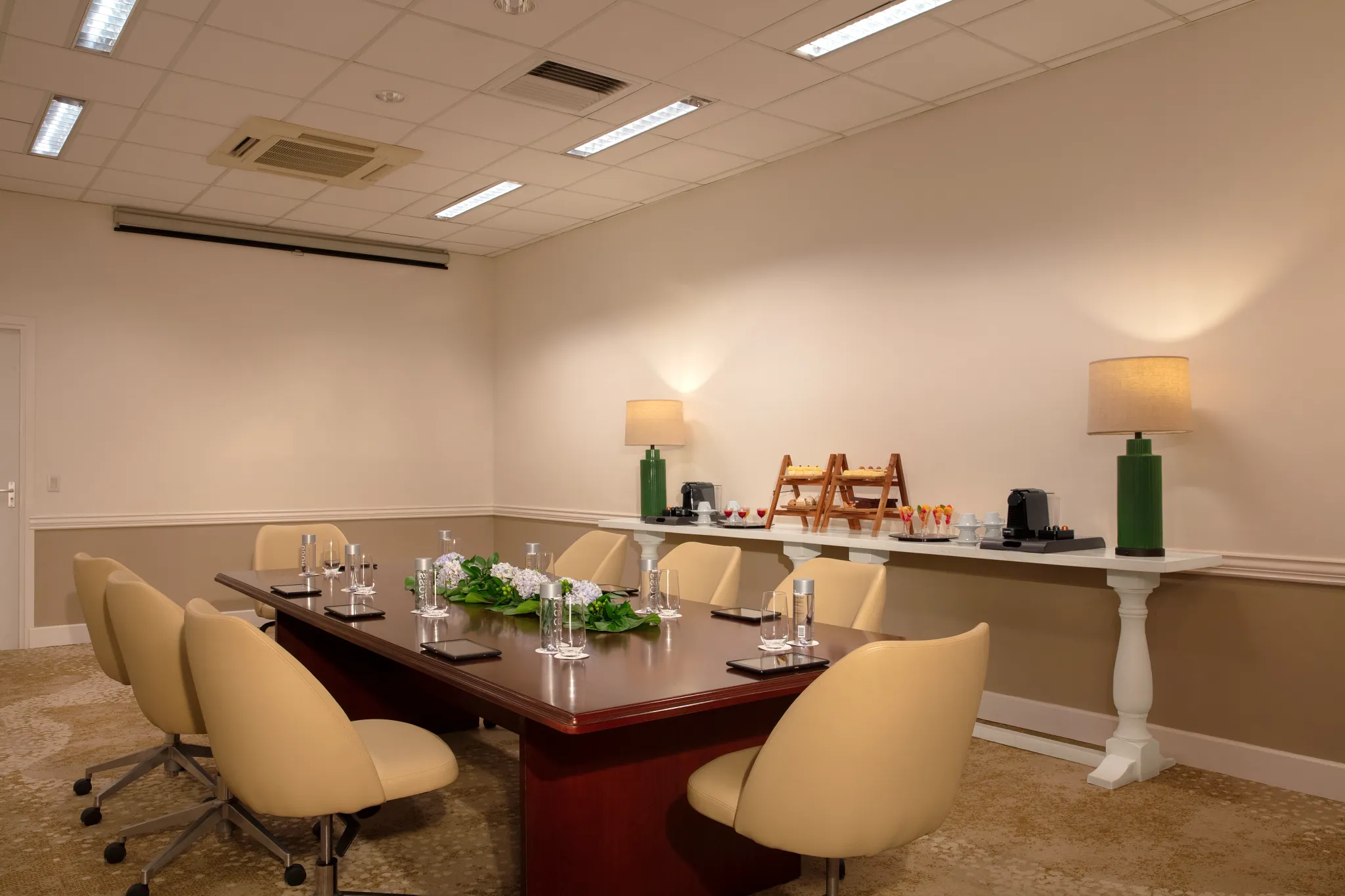 Small meeting room with conference table setup at Dreams Curaçao Resort, Spa & Casino.