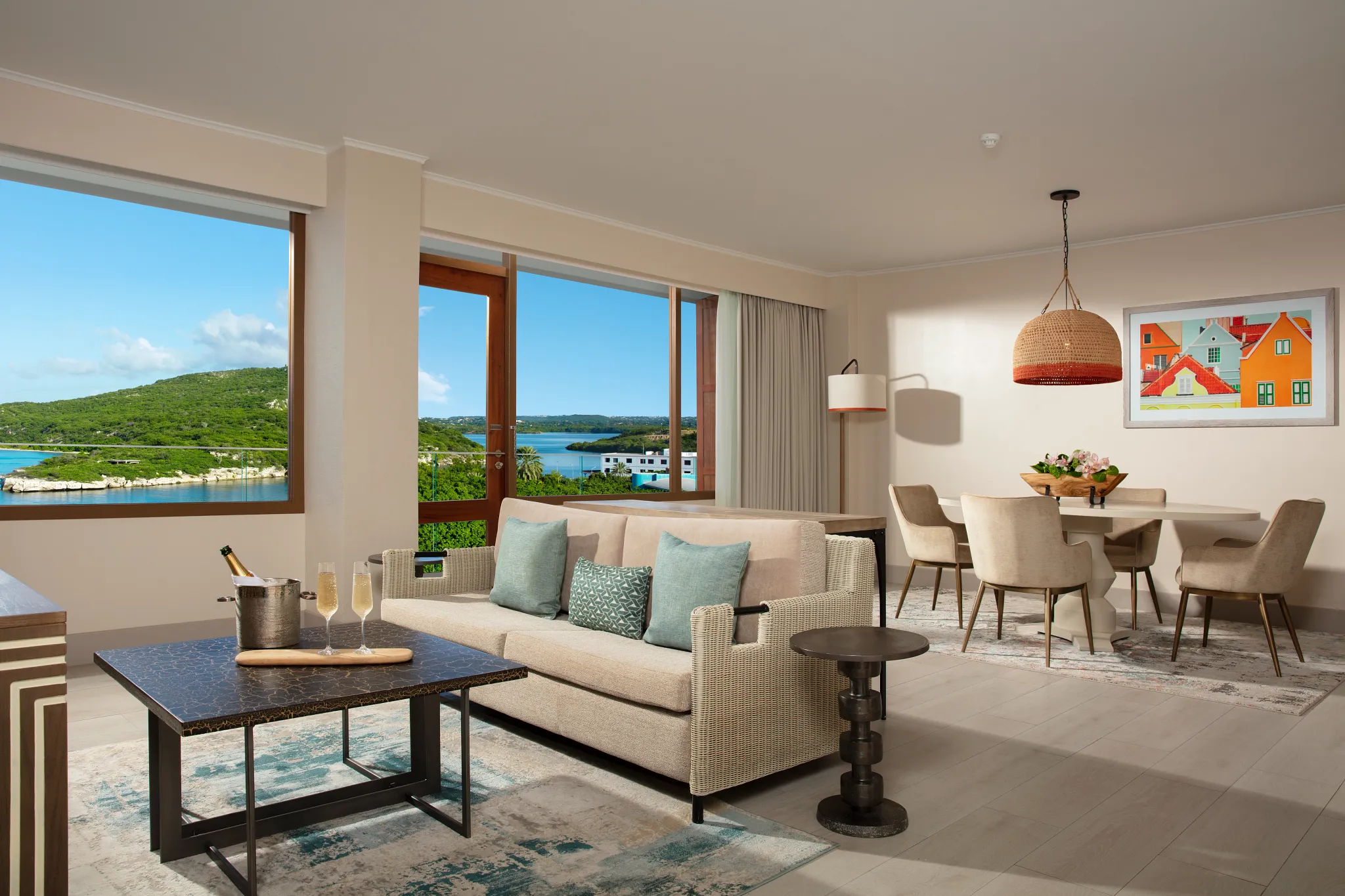 Spacious presidential suite living room with ocean views and modern furnishings at Dreams Curaçao Resort.